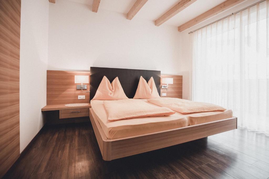 Postel nebo postele na pokoji v ubytování Seppmair
