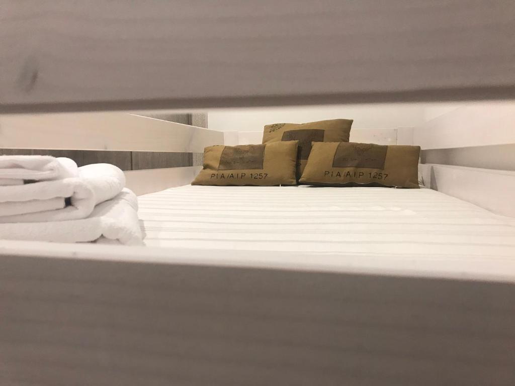 Posteľ alebo postele v izbe v ubytovaní Apartament Neret II