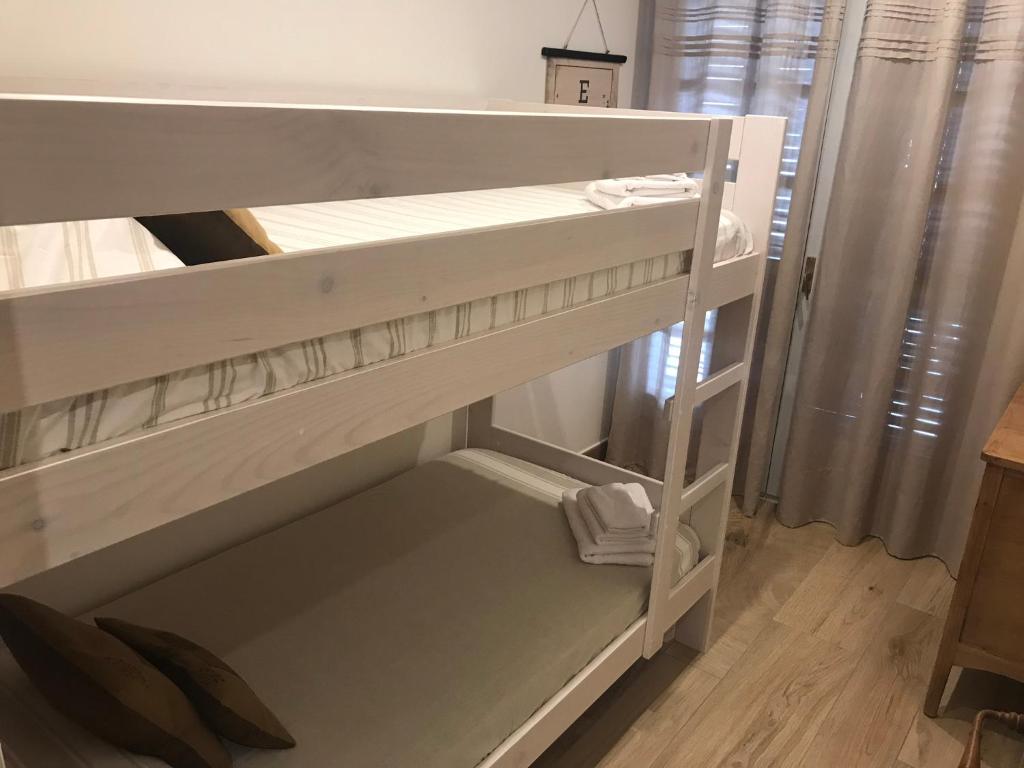 Posteľ alebo postele v izbe v ubytovaní Apartament Neret II