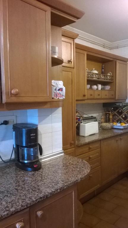 Kuchyň nebo kuchyňský kout v ubytování Habitacion Privada en Piso Familiar