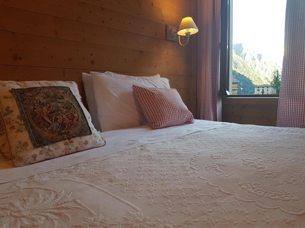 Postel nebo postele na pokoji v ubytování Hotel Pedretti
