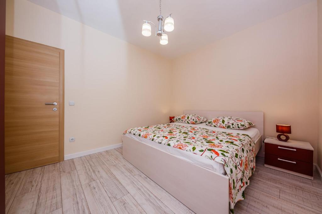 Posteľ alebo postele v izbe v ubytovaní Apartman Markulin