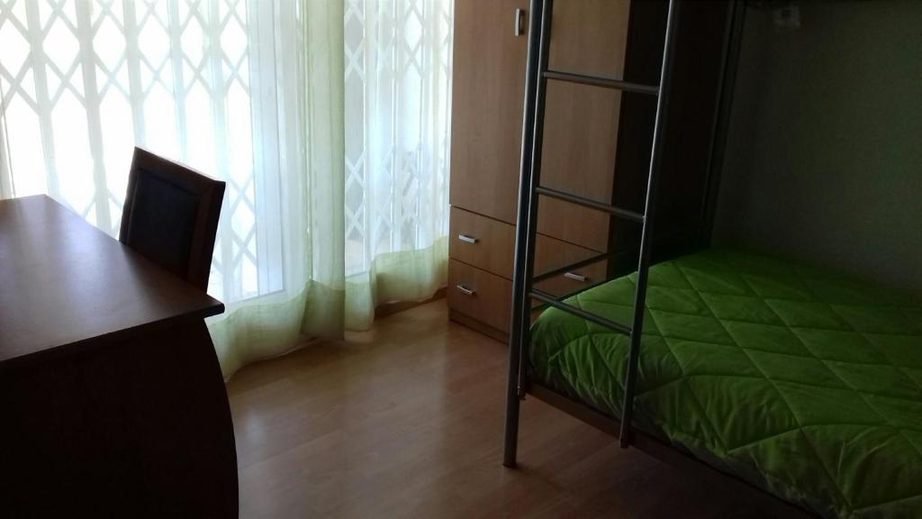 Postel nebo postele na pokoji v ubytování El Cid