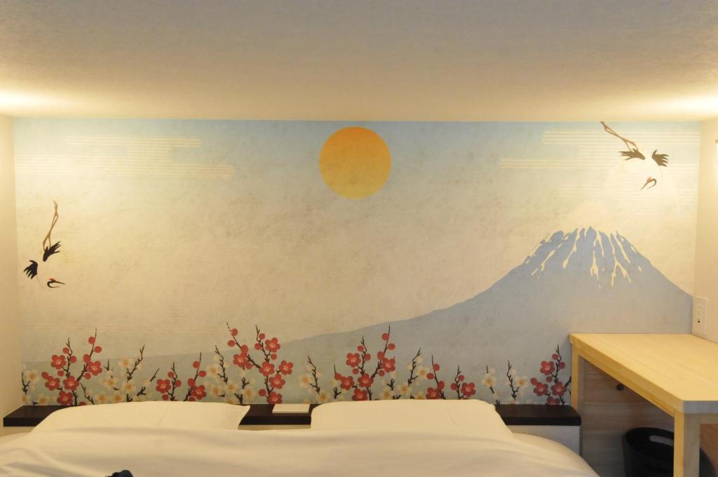 Postel nebo postele na pokoji v ubytování NASUBI Mt. Fuji Backpackers