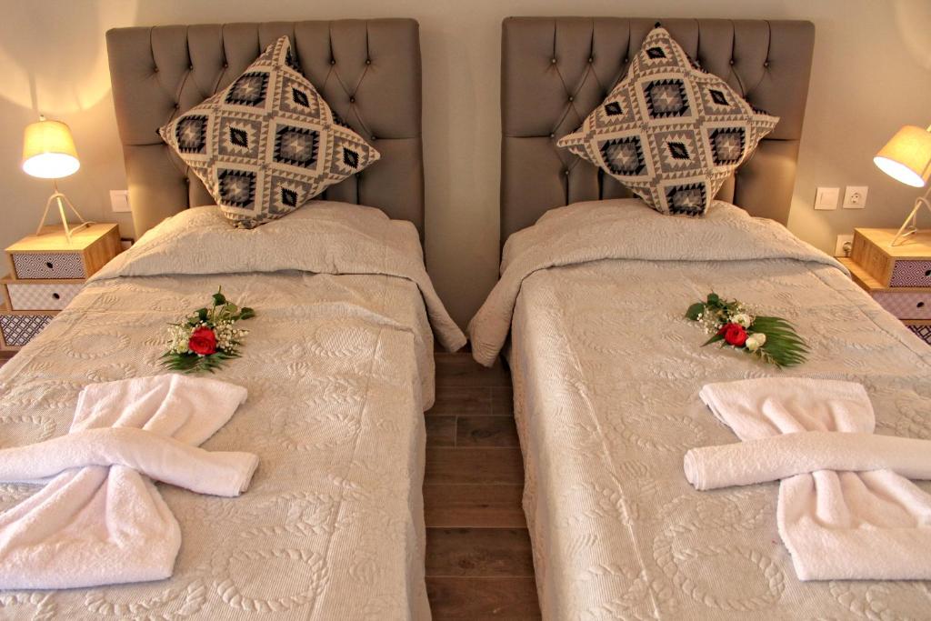 A bed or beds in a room at Astrakeroula Corfu