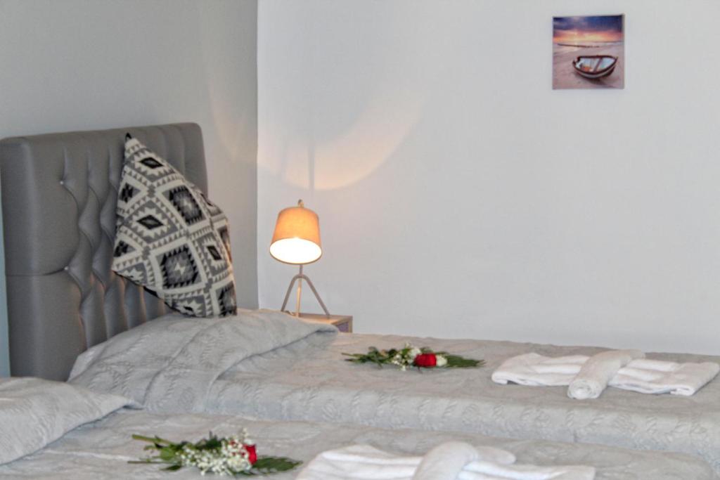 A bed or beds in a room at Astrakeroula Corfu