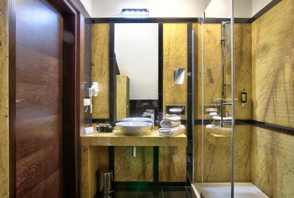 Kúpeľňa v ubytovaní BoutiqueHotel Aristo