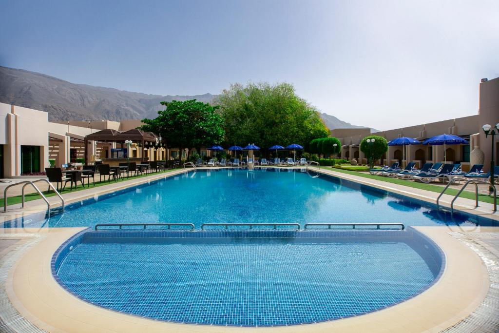 Bazén v ubytování Golden Tulip Nizwa Hotel nebo v jeho okolí