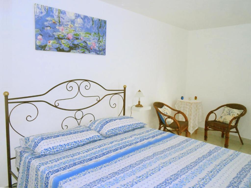 Postel nebo postele na pokoji v ubytování B&B Il Patio