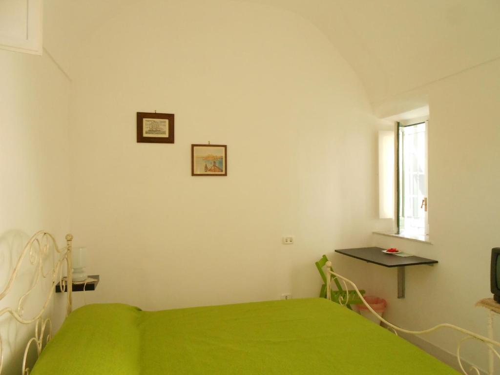 Postel nebo postele na pokoji v ubytování B&B Il Patio