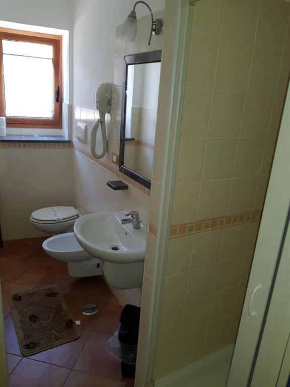 Koupelna v ubytování Locanda Aria del Re