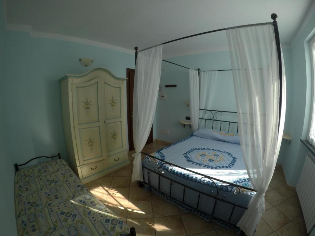 Postel nebo postele na pokoji v ubytování B&B Oasi Verde