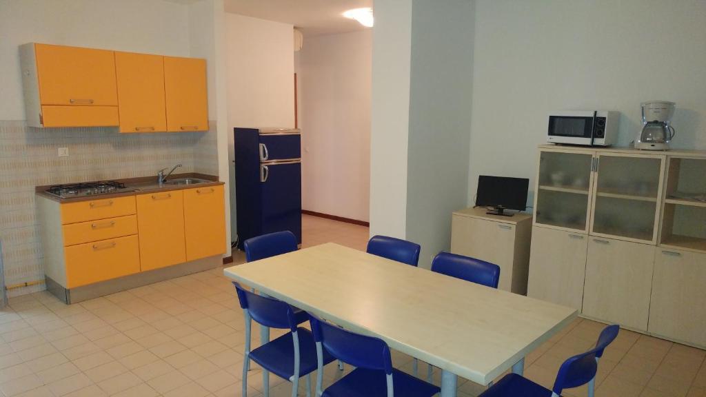 Kuchyňa alebo kuchynka v ubytovaní Condominio Moschettieri