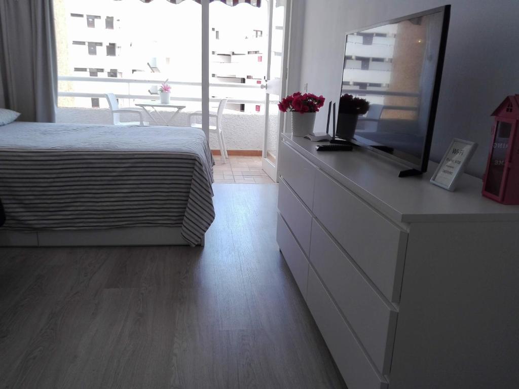 Postel nebo postele na pokoji v ubytování Borinquen Private Homes