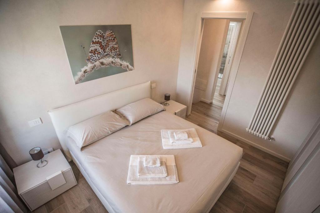Posteľ alebo postele v izbe v ubytovaní Relais Madergnago
