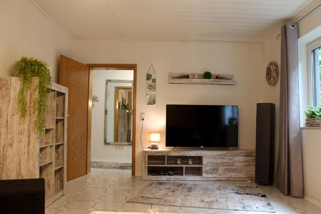 TV a/nebo společenská místnost v ubytování Ferienwohnung " Gecko 2 "
