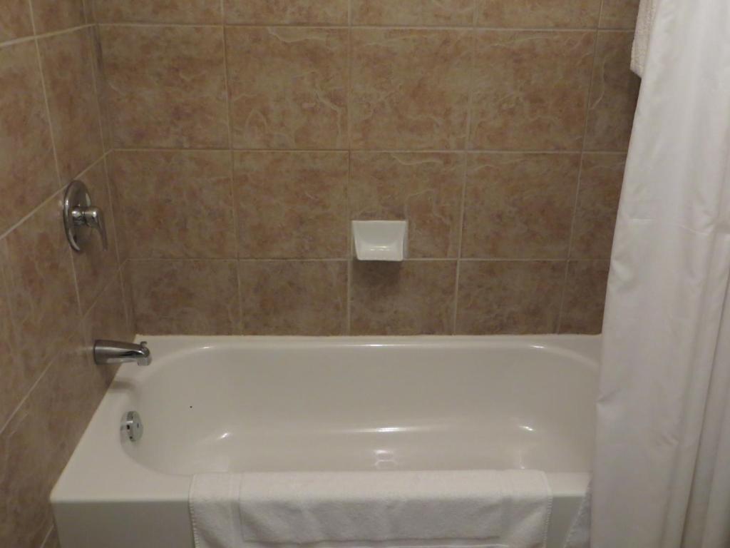 Koupelna v ubytování Hotel Le Voyageur