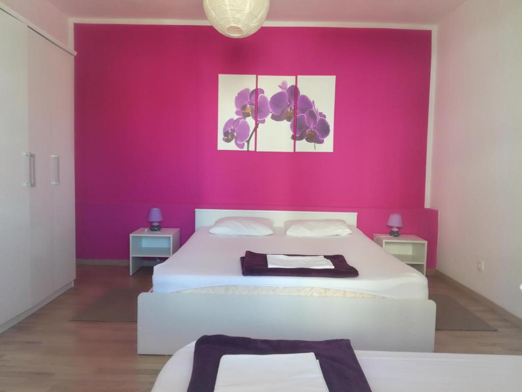 Postel nebo postele na pokoji v ubytování Dama Apartment