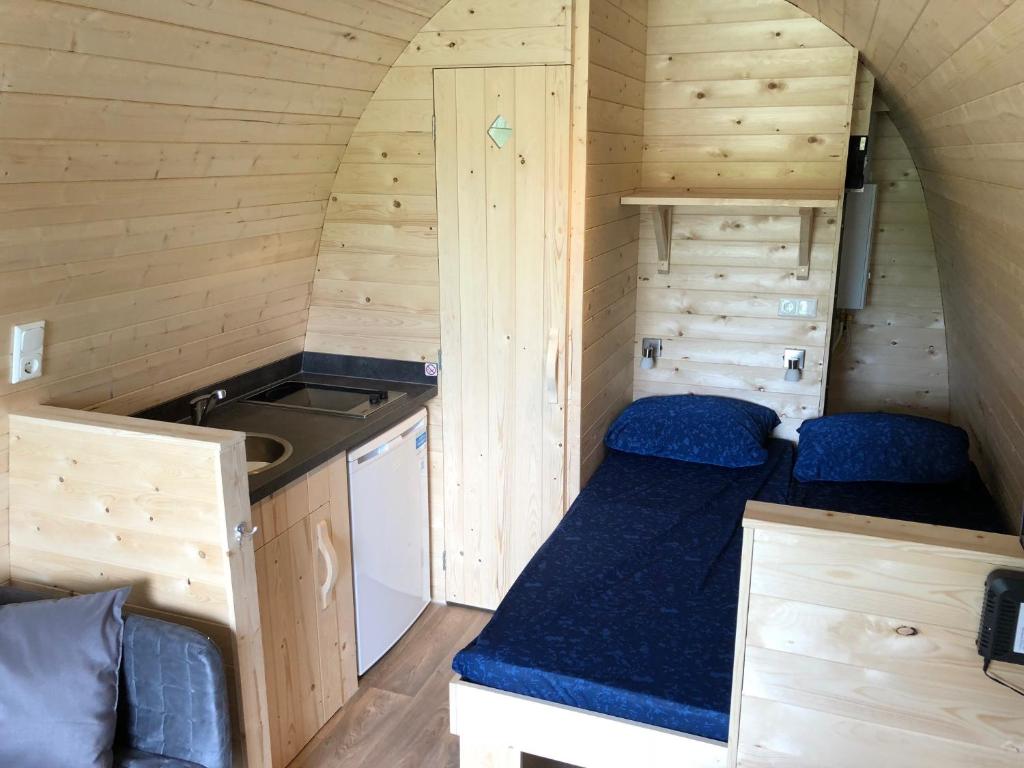 Kuchyň nebo kuchyňský kout v ubytování Camping Ginsterveld