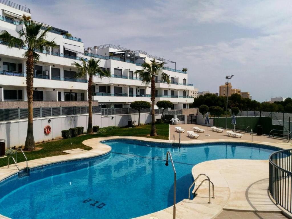 Bazén v ubytování Apartamento con piscina nebo v jeho okolí