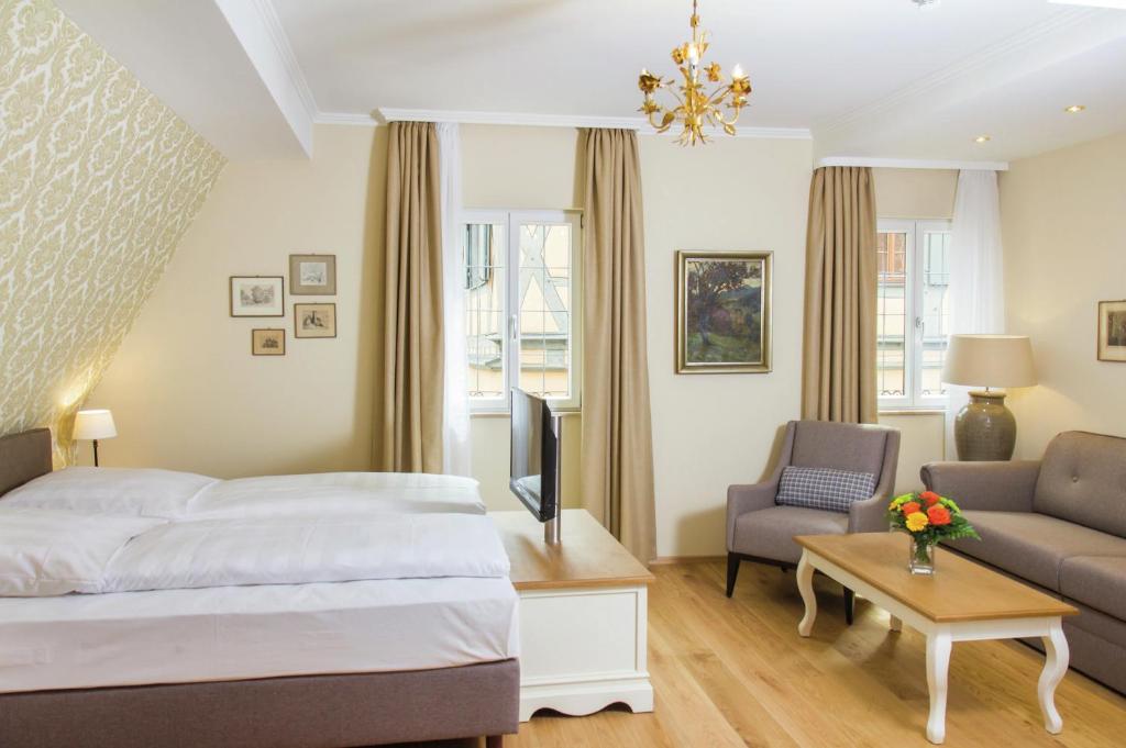 Postel nebo postele na pokoji v ubytování Hotel Reichsküchenmeister