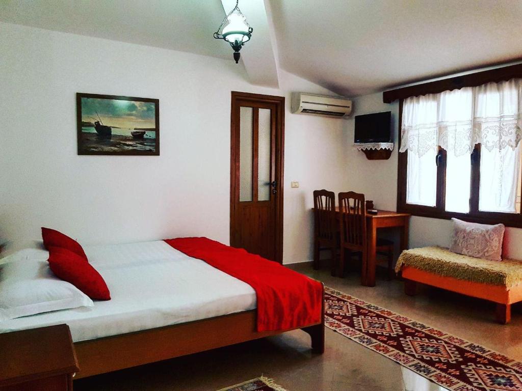 Posteľ alebo postele v izbe v ubytovaní Hotel Berati