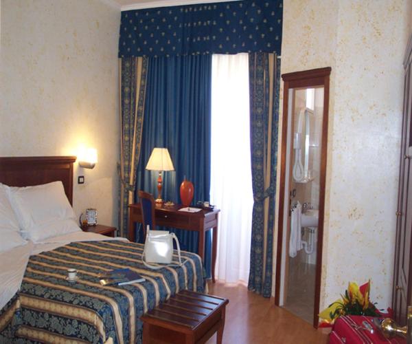 Postel nebo postele na pokoji v ubytování Hotel Alexander Resort