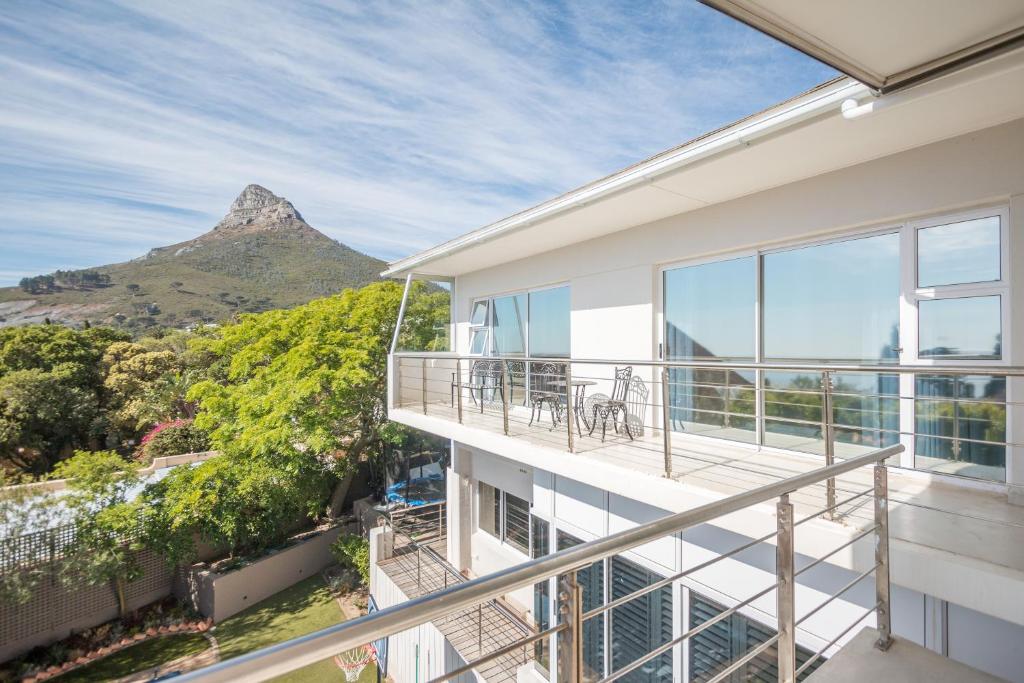 a balcony with a view of the mountain at 2 on Medburn in Cape Town