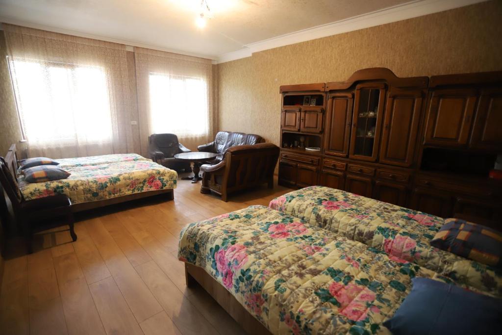 Postel nebo postele na pokoji v ubytování Papazo