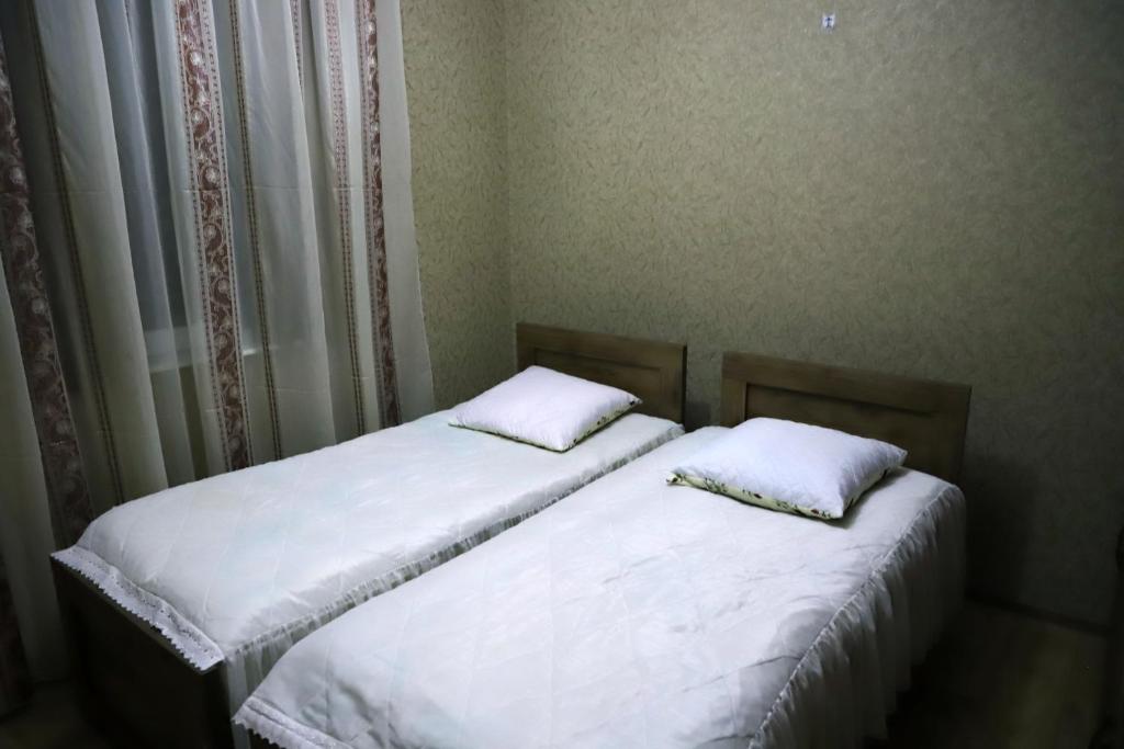 Postel nebo postele na pokoji v ubytování Papazo