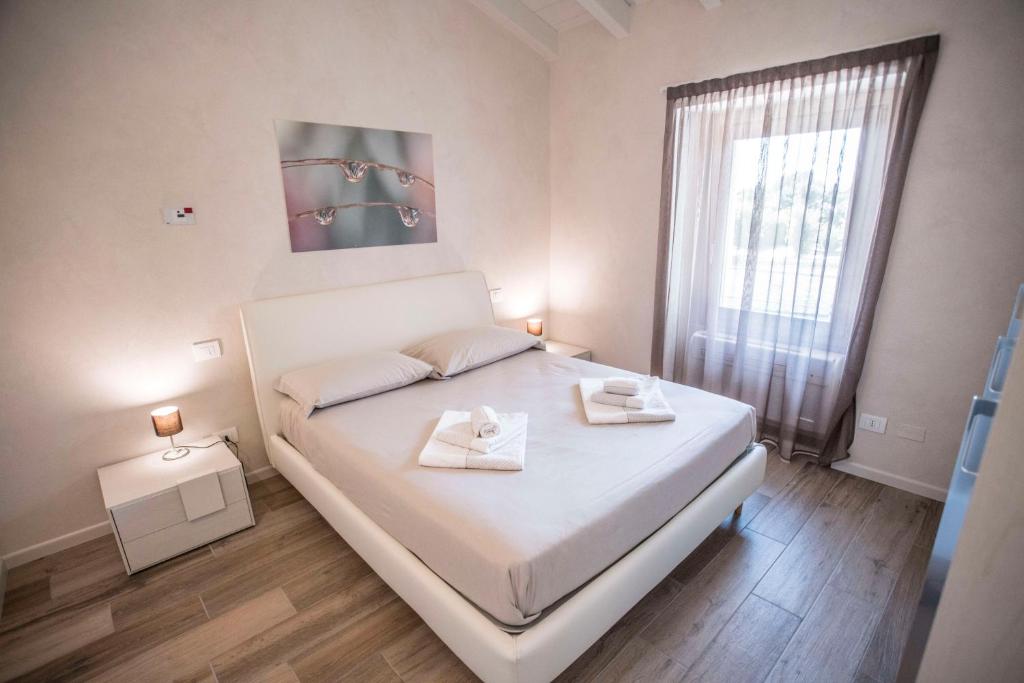 Posteľ alebo postele v izbe v ubytovaní Relais Madergnago