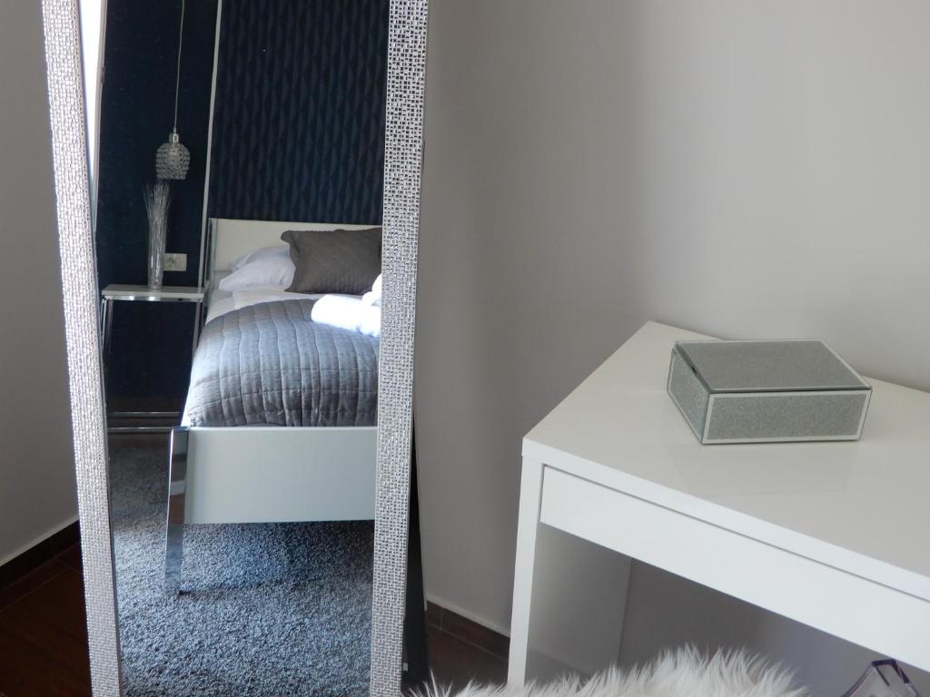 Posteľ alebo postele v izbe v ubytovaní Apartman Nia