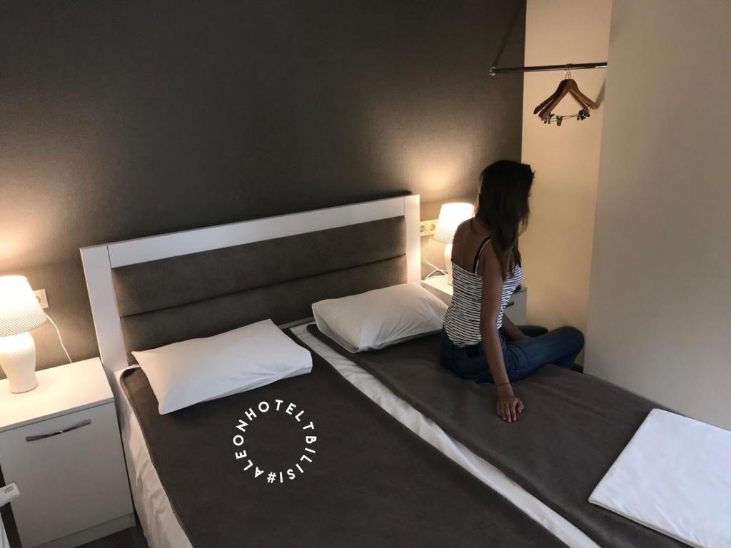 Postel nebo postele na pokoji v ubytování Aleon Hotel