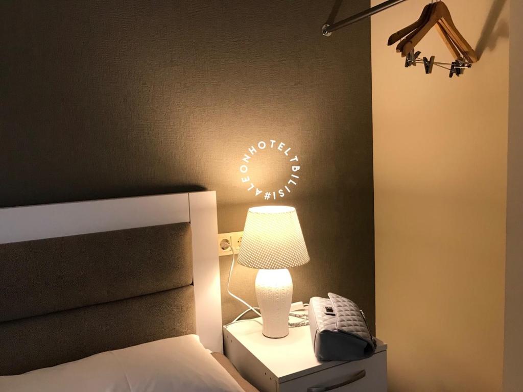 Postel nebo postele na pokoji v ubytování Aleon Hotel