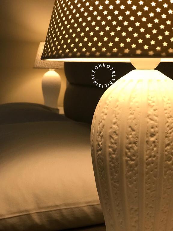 Postel nebo postele na pokoji v ubytování Aleon Hotel