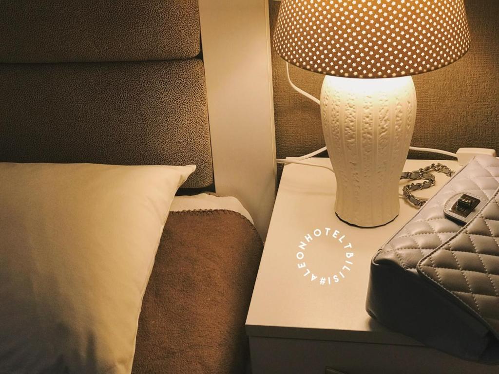 Postel nebo postele na pokoji v ubytování Aleon Hotel