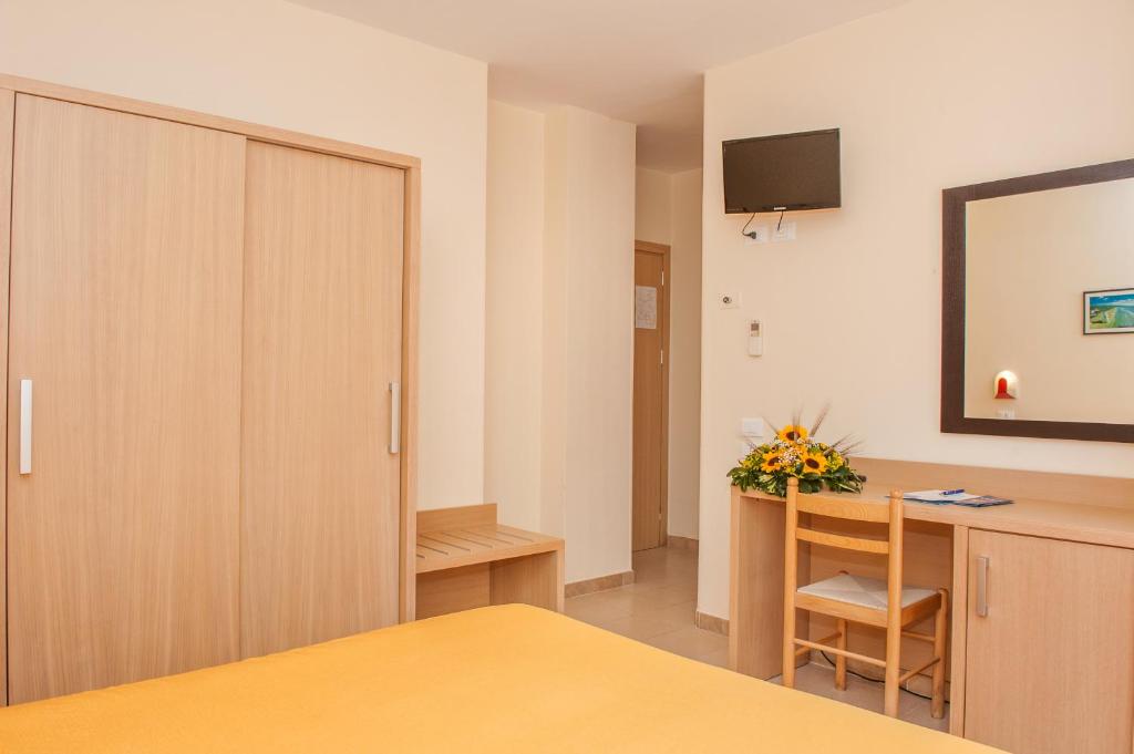Letto o letti in una camera di Hotel Cristalda