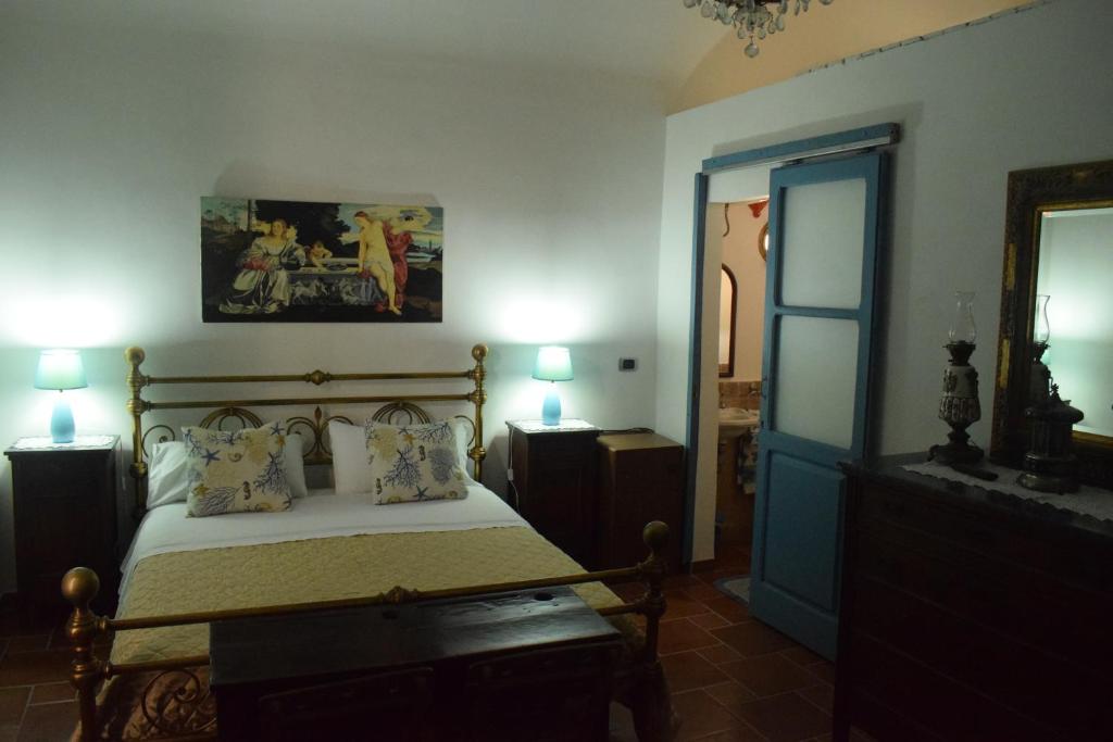 A bed or beds in a room at B&b Lemon Garden