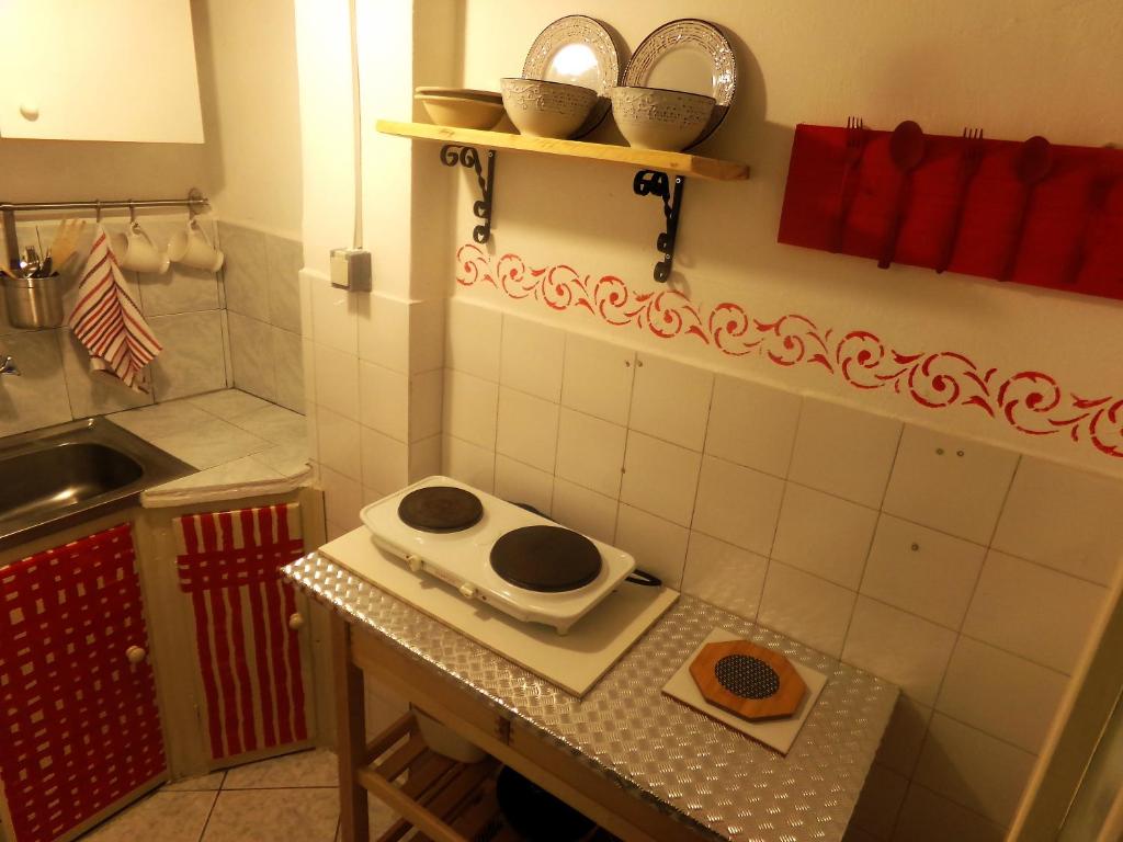 Kuchyň nebo kuchyňský kout v ubytování Leia Guest House