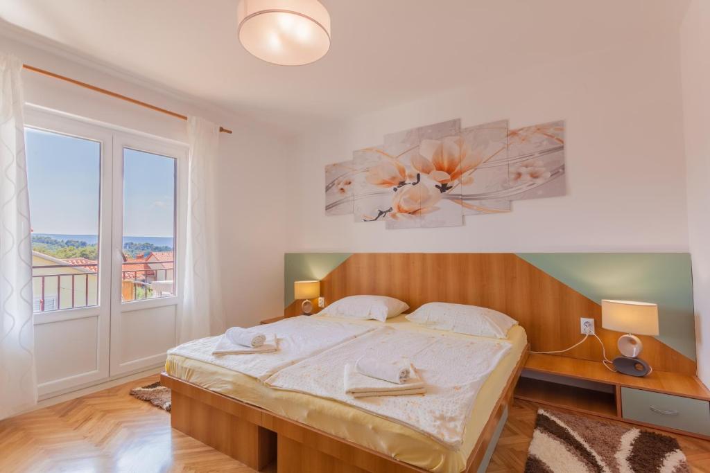 Voodi või voodid majutusasutuse Guesthouse Maver toas