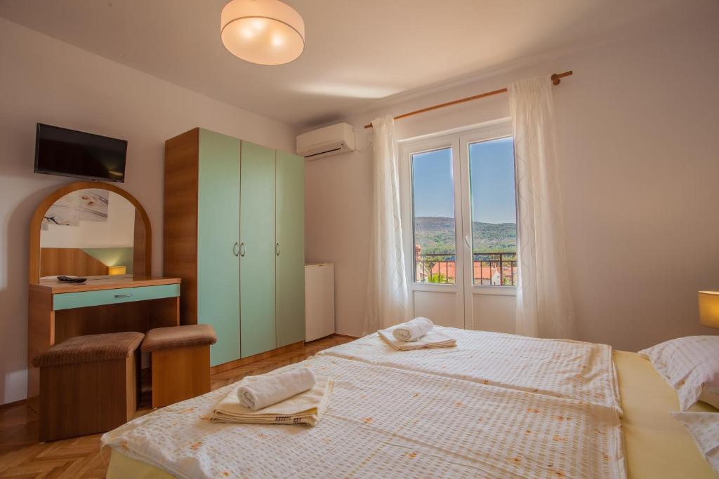 Voodi või voodid majutusasutuse Guesthouse Maver toas