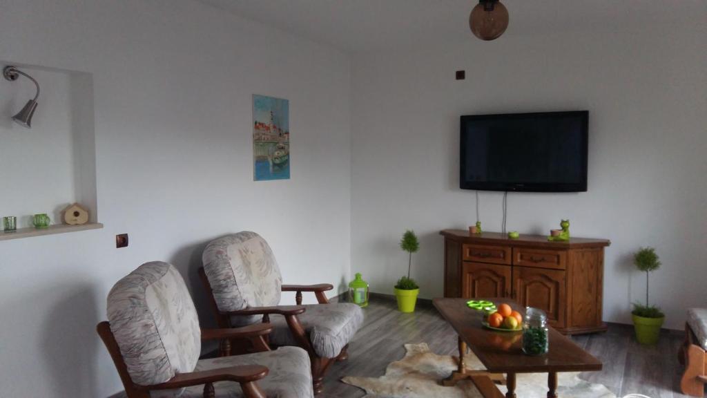 TV a/nebo společenská místnost v ubytování apartman Marina