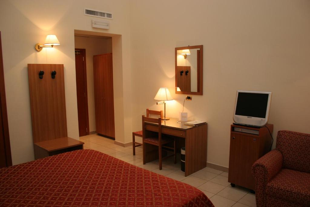 TV a/nebo společenská místnost v ubytování Hotel Adria