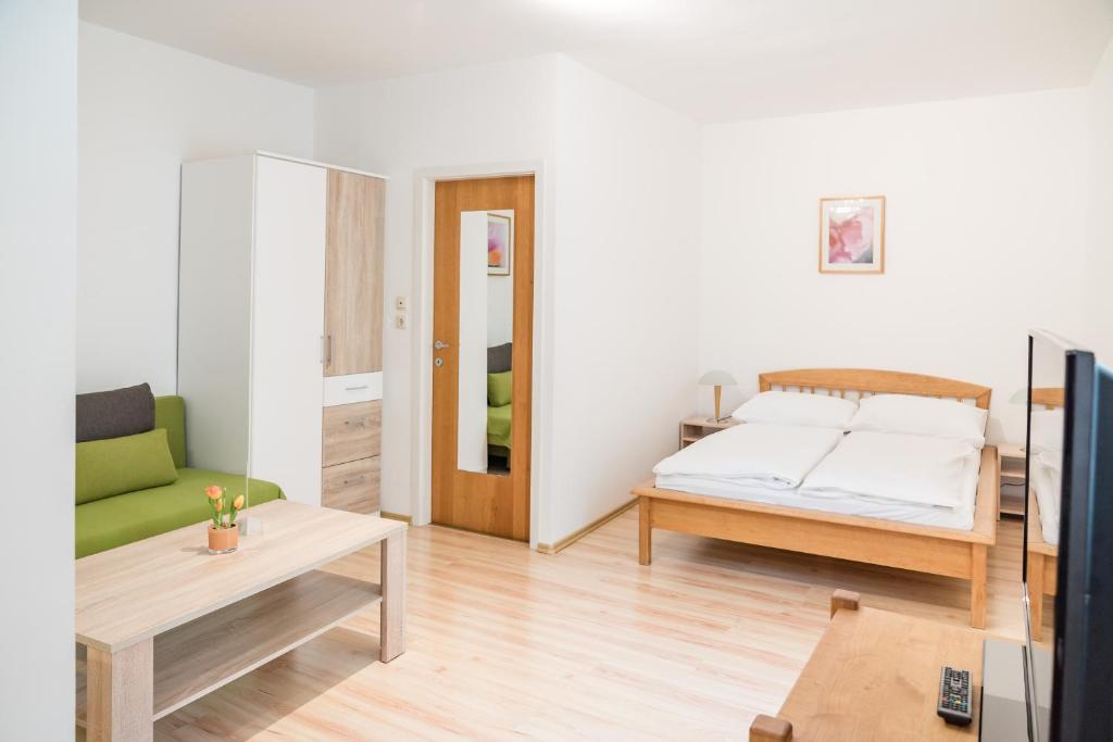 Postel nebo postele na pokoji v ubytování Smart Liv'in Laabnerhof
