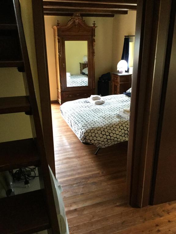 Łóżko lub łóżka w pokoju w obiekcie Casa San Bartolomeo