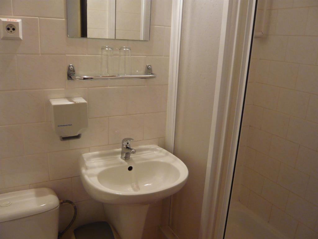 Koupelna v ubytování Hotel Hasa