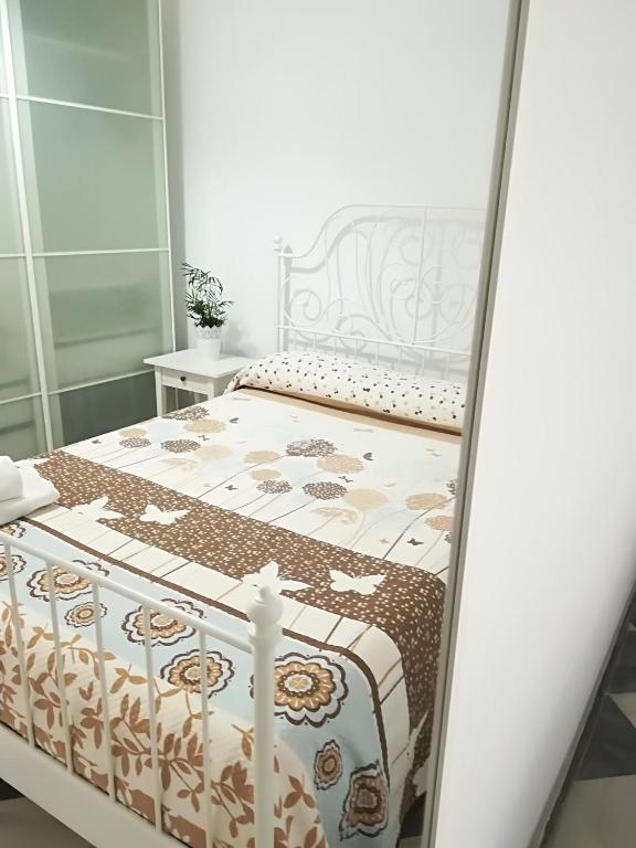 Postel nebo postele na pokoji v ubytování Ave Maria 7