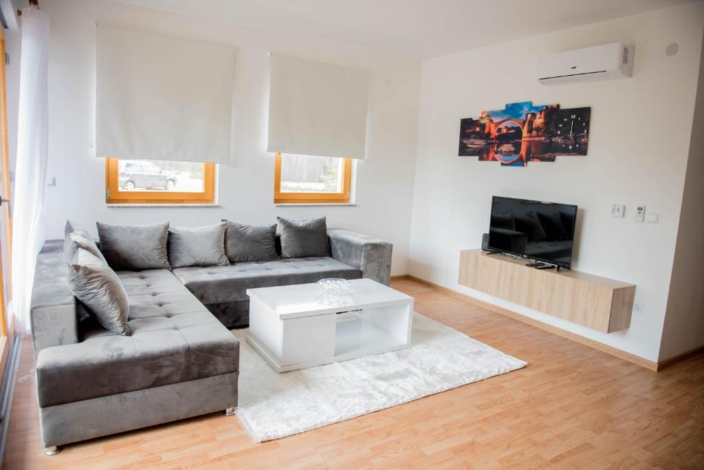 Posezení v ubytování Leader apartment