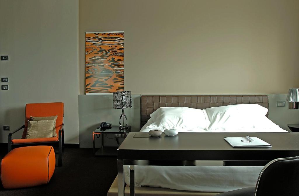 Postel nebo postele na pokoji v ubytování G Hotel Ancona