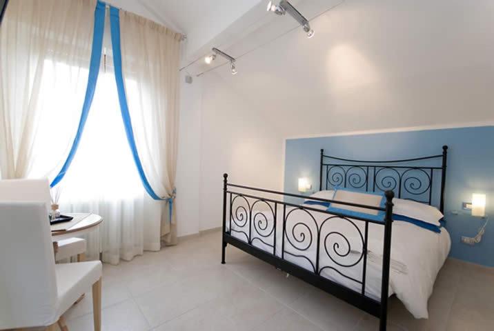 Postel nebo postele na pokoji v ubytování Villa Cristina
